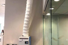 Portable air conditioner in retail building
