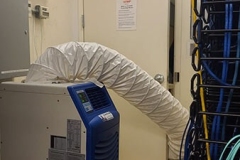 Portable air conditioner unit in use in a server room