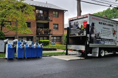 Neat Heat truck delivering temporary ac units to apartment complex