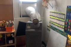 temporary ac unit used in a NYC school location