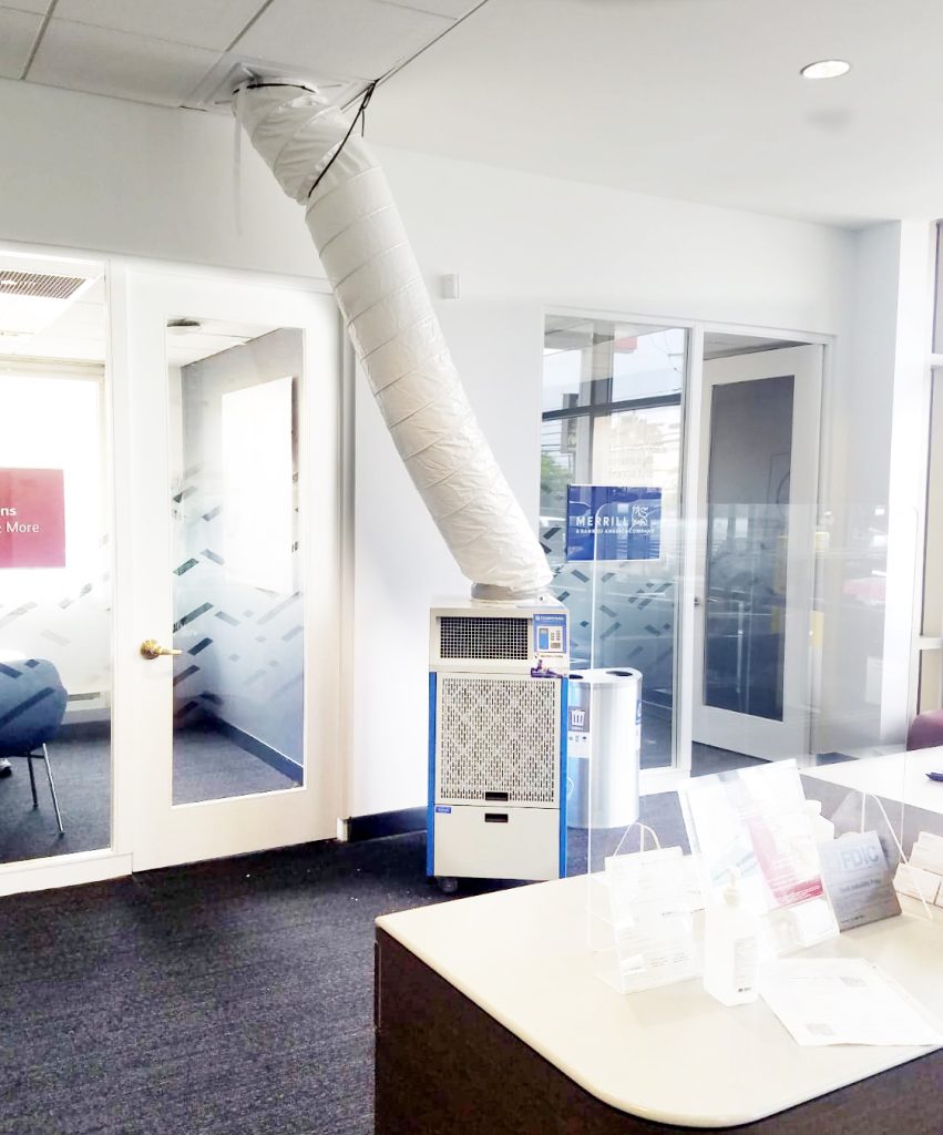 Portable air conditioning unit in use at a commercial business in NYC.